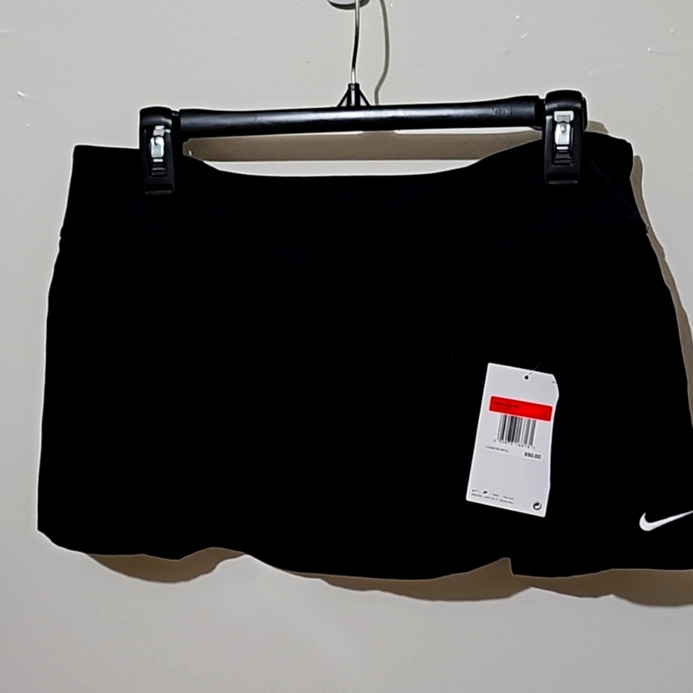Nike Swimsuite Bottom. New with tags. Size L, Black with White Swooch. 10'long